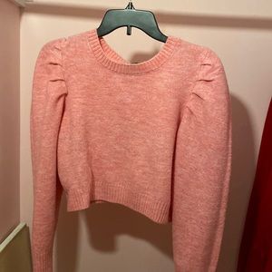 pink cropped long sleeve shirt